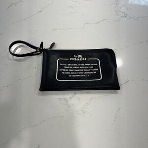 Coach convertible black leather make up bag with huge logo print